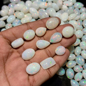 โอปอลไฟธรรมชาติทรงรีแบบหลวม ขัดเงา สีโอปอล  ผ่านการประเมินโดยบุคคลที่สาม 5000 กะรัต  เหมาะสำหรับทำเครื่องประดับ - Product Image 1