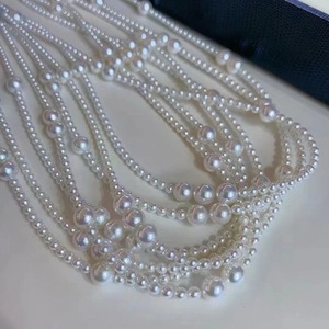 Collier en perles naturelles fantaisie de grand diamètre 7-12 mm plaqué or 18 carats avec un design tissé de perles laser - Product Image 3