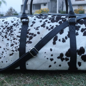 กระเป๋าหนังวัวแบบ unisex ทรงสี่เหลี่ยมผืนผ้า ปิดด้วยซิป หูหิ้วคู่ กระเป๋าเดินทางแฟชั่น ความจุ 20-36 ลิตร - Product Image 4