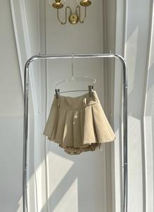 Coshe Cici Mini-jupe d'été décontractée pour dames Taille haute ceinturée plissée Design Vietnam Fabriqué avec une taille naturelle Usage quotidien - Product Image 3