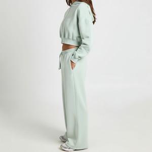 Nouvel arrivage : Ensemble deux pièces tendance avec crop top zippé et pantalon de jogging ample, respirant, couleur unie, tenue décontractée, survêtement OEM - Product Image 3