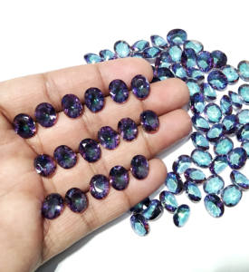 Topacio Místico Ovalado Facetado Creado en Laboratorio al por Mayor |   Piedra Suelta con Recubrimiento Arcoíris |   8x10 mm |   Uso en la Creación de Joyas - Product Image 6