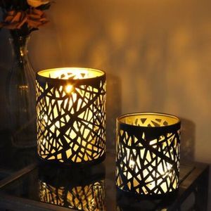Porte-bougie votif en métal unique, soigneusement conçu pour sublimer le décor grâce à une lumière chaleureuse et un attrait artisanal. - Product Image 4