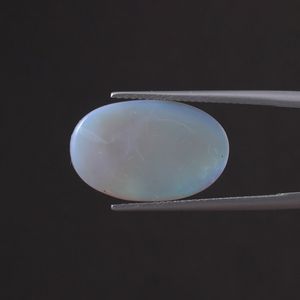 Opale naturelle blanche en vrac, 6,05 carats, taille ovale 19,5x11mm, certifiée IGI, taillée à la main, polie, avec traitement de cirage/lustrage léger - Product Image 3