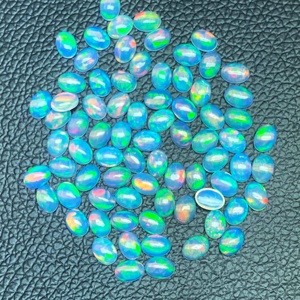 N.N. Opales d'Éthiopie naturelles blanches 4x5mm, cabochons ovales lisses, opales à jeu de couleurs/effet feu, pierres précieuses en vrac en gros à vendre - Product Image 2
