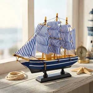 Modèle de bateau à voile en bois artisanal avec décorations nautiques rayées bleues et blanches, avec support de présentation pour table ou maison - Product Image 5