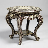 Table élégante artisanale pour une décoration intemporelle du salon et de la chambre à coucher, design complexe en incrustation d'os, ronde, en bois, moderne