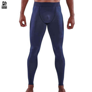 กางเกงเลกกิ้งผู้ชายแบบรัดรูปสั่งทำพร้อมโลโก้ขายส่ง-ผ้ายืดสแปนเด็กซ์/โพลีเอสเตอร์ แห้งเร็ว ระบายอากาศได้ดี สีสันตามสั่ง คุณภาพสูง - Product Image 1