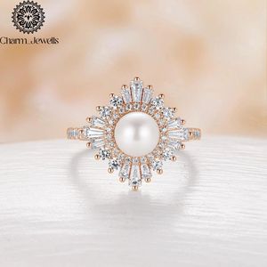 Bague de fiançailles Charm_Jewells pour femme, plaquée or rose, avec perle d'eau douce, moissanite taille baguette conique, motif floral, sertie à griffes - Product Image 1