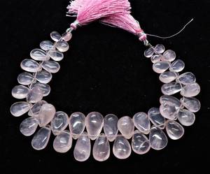 ลูกปัดโรสควอตซ์ธรรมชาติทรงลูกแพร์เรียบเนียน ขนาด 7x10 ถึง 9x13 มม.  ขนาดเส้น 8 นิ้ว ลูกปัดโรสควอตซ์เรียบเนียน - Product Image 1