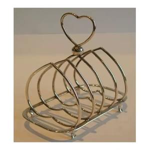 Support à pain grillé en métal de qualité supérieure pour une expérience petit-déjeuner organisée et sereine, avec un design favorisant le flux d'air autour de chaque tranche. - Product Image 1