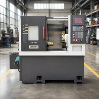 Tour CNC à banc incliné de 30 degrés et base en fonte HT300 pour pièces de type arbre et manchon et barres de 45 mm