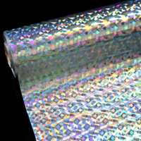 SHENGSHENG Rollo de Lámina Metálica Plateada Holográfica Ecológica Personalizada de 12 Micras de Material PET para Estampado en Caliente e Impresión Digital
