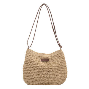 Complement your sunny weather outfits with this charming Natural yarn <b>bag</b> featuring a <b>soft</b> slouchy shape and <b>leather</b> details tod - Product Image 1