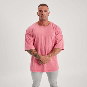Camiseta de algodón rosa oversize para hombre, manga corta, cuello redondo, estilo casual, tejido de punto, color liso, corte lavado - Product Image 1