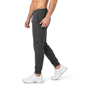 Pantalones deportivos de hombre, color gris oscuro, cintura elástica, con cordón ajustable y bolsillos laterales, estilo casual para otoño e invierno. - Product Image 6