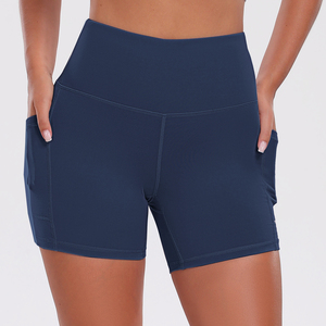 Shorts de yoga taille haute couleur unie avec poches, effet ventre plat, en nylon sans couture, très extensible, pour femme, fitness et sport - Product Image 3