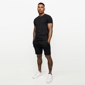 Ensemble T-shirt et short d'été pour homme avec logo personnalisé, style streetwear unisexe deux pièces, séchage rapide, 100 % coton - Product Image 1