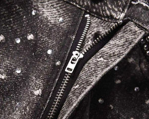 La collection festive la plus populaire, mettant en vedette des pierres argentées à fort contraste sur ces jeans en denim noir ornés de strass. - Product Image 3