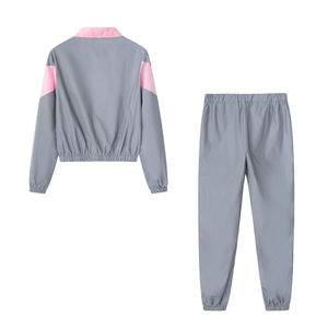 Ensemble deux pièces décontracté en nylon pour femme avec logo personnalisé OEM, survêtement coupe-vent streetwear personnalisé pour femme - Product Image 2