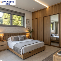 Suite de chambre à coucher de luxe de style italien avec lit flottant LED en bois, tailles Queen/King, intégrant un placard et un bureau de coiffeuse pour usage scolaire