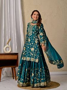 Lehenga choli de seda chinnon azul verde radiante con bordado de lentejuelas brillantes, mangas largas, atuendo étnico perfecto para bodas. - Product Image 1