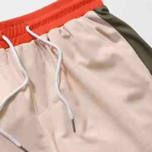 Ensemble de survêtement coupe-vent léger en nylon personnalisé pour homme – Ensemble deux pièces sportswear : veste à capuche et short - Product Image 3