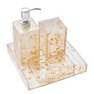 Elegante Juego de Baño de Cinco Piezas de Resina Redonda con Detalles Dorados, Impermeable, Ecológico y Moderno, Dispensador de Jabón, Vaso y Bandeja - Product Image 1
