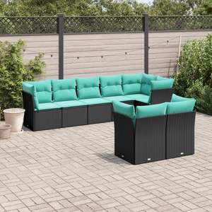 Conjunto de sofás de jardín negros con cojines azules - Product Image 1