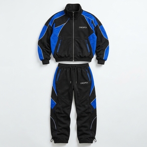 Ensemble de survêtement personnalisé pour homme, noir et bleu, avec veste zippée color block et pantalon de jogging, style athlétique streetwear, vente en gros OEM, vêtements de sport - Product Image 1