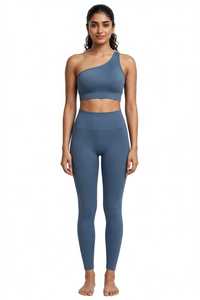 Conjunto de yoga de dos piezas para mujer: sujetador deportivo asimétrico de un solo hombro transpirable de elastano/nailon y leggings de cintura alta acanalados de color liso. - Product Image 3