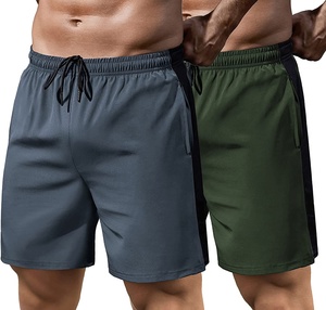 Pantalones cortos deportivos de secado rápido para hombre, color sólido, cintura con cordón y bolsillos, ropa deportiva de tiro medio, azul y negro - Product Image 2
