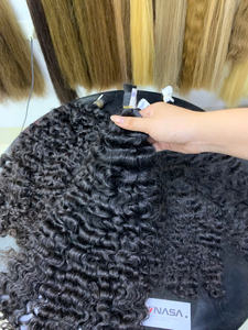 Cheveux vietnamiens 100 pour cent cheveux bruts dans la conception bouclée avec une texture soyeuse et épaisse - Product Image 4