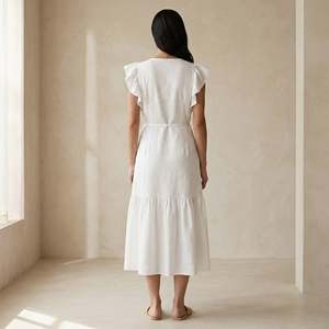 Hermoso y Elegante Vestido Midi Cruzado de Algodón Blanco con Volantes para Mujer, con Tela Ligera y Ajuste Cómodo para Uso Diario - Product Image 5