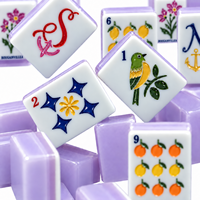 Jeu de Mahjong violet de 160 tuiles avec détails gravés et dos à motifs pour les soirées de jeu en famille et la vente au détail