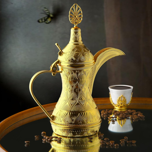 Classic etched brass coffee pot with traditional Arabic engravings, available at wholesale prices for authentic kitchenware. - Product Image 4