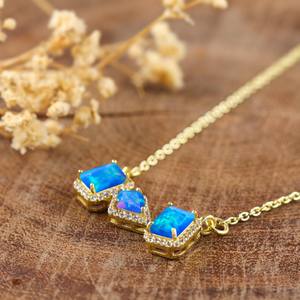 จี้โอปอลไฟสีน้ำเงิน สร้อยคอผู้หญิง โอปอลเอธิโอเปีย หินประจำเดือนตุลาคม สไตล์มินิมอล เงินแท้ 925 ชุบทอง 14K ได้รับการรับรองจาก IGI - Product Image 6