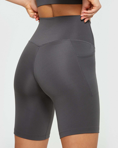 Shorts de compression en graphite pour femmes avec poches, taille haute, anti-transpiration, vente en gros - Product Image 4