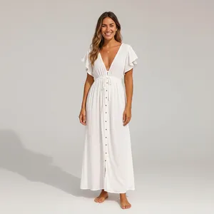 Vestido maxi bohemio blanco para mujer, con escote en V profundo, mangas con volantes, botones en la parte delantera, estilo fluido y largo, ideal para el verano. - Product Image 1