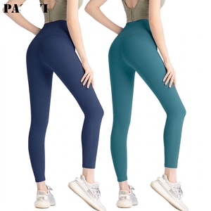 Pantalones de yoga y entrenamiento para mujer, personalizados al por mayor, de cintura alta, hasta el tobillo, lisos, transpirables, de elastano/poliéster, con efecto push-up para glúteos - Product Image 1