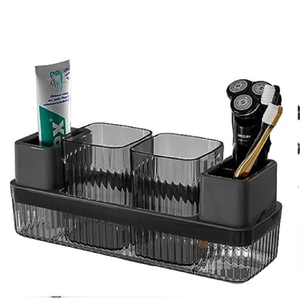 Elegante contenedor acanalado de color oscuro para guardar una afeitadora eléctrica, pasta de dientes con sabor a menta y cepillos de dientes, disponible a precios de mayorista. - Product Image 1
