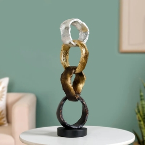 Escultura Moderna de Lujo con Anillos Entrelazados Abstractos y Acabado Metálico Texturizado en Plata, Oro y Bronce para Sala de Estar - Product Image 1