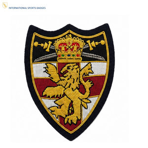 Badges décoratifs personnalisés avec logo, épingle de sûreté, broderie haute densité, tissu écologique de qualité supérieure, vente en gros d'usine, OEM - Product Image 1