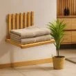 Wall mounted folding <b>chair</b> with a wooden seat in a natural wood finish for indoor use. - Product Image 2