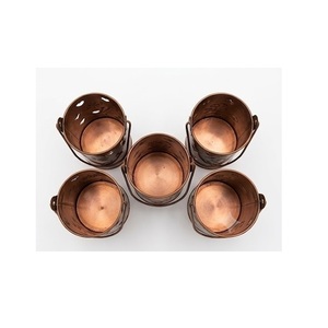 Portavelas cilíndrico de metal con acabado antiguo en cobre, con recortes de árbol y estrella, para decoración navideña del hogar. - Product Image 5