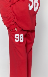 Pantalon de jogging décontracté rouge à jambe large pour femme en polyester et coton, avec logo personnalisé, pour la vente en gros - Fournisseur OEM - Product Image 3