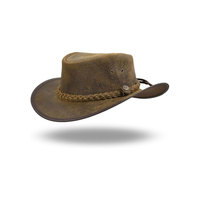 Chapeau de cowboy en cuir avec bande tressée et sangle de mentonnière marron