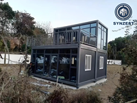 Maison conteneur préfabriquée de 20 pieds avec toit en pente, mur-rideau en verre, conteneur démontable en kit pour habitation, boutique ou bureau