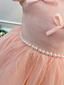 ชุดเดรสยาวหลายชั้นคุณภาพสูงสำหรับเด็กผู้หญิง ประดับมุกและโบว์ ตกแต่งอย่างสวยงาม เป็นมิตรกับสิ่งแวดล้อม รับผลิตตามแบบ ODM/OEM เหมาะสำหรับทุกโอกาส - Product Image 3