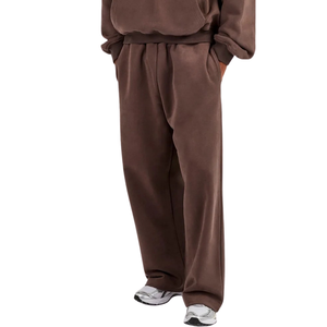 Conjunto de chándal de dos piezas para hombre: Sudadera con capucha extragrande con bolsillo canguro y pantalones de pierna ancha con dobladillo abierto, cintura elástica, ideal para descansar. - Product Image 1